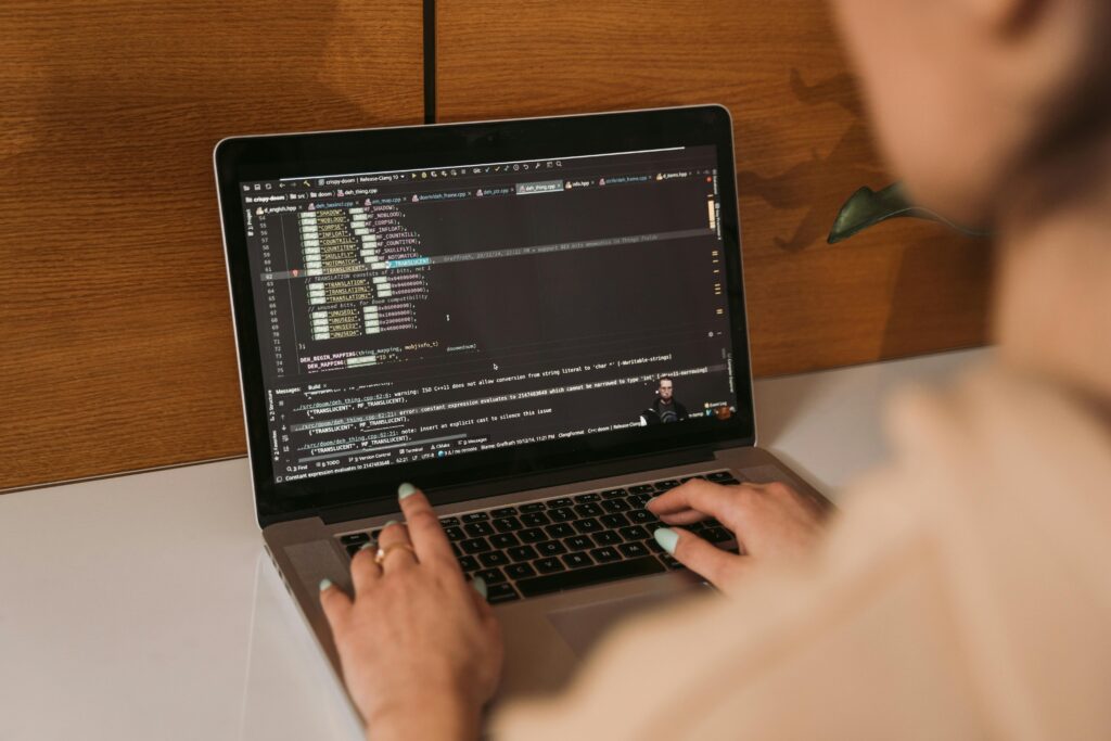 Close-Up Shot of a Person Using a Laptop